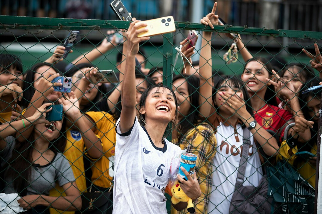 group of fans cheering