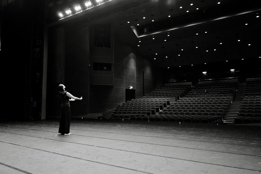woman directing theater
