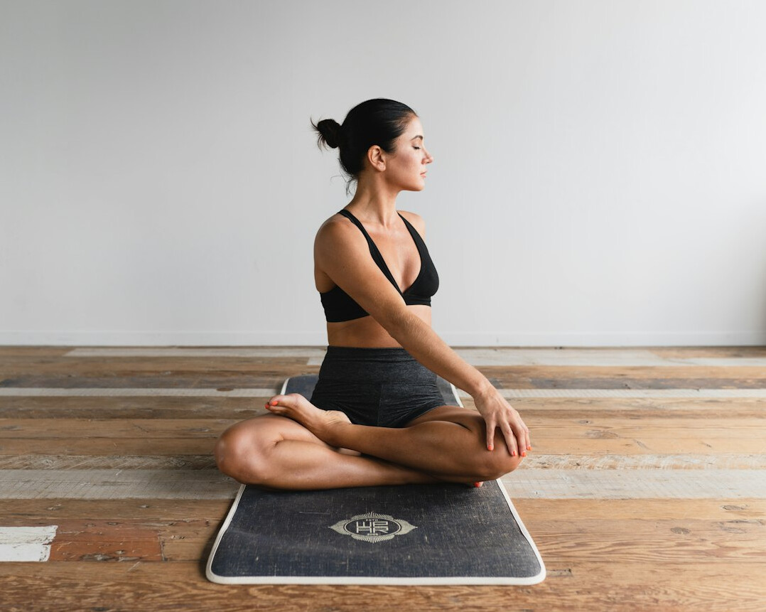 person practicing yoga